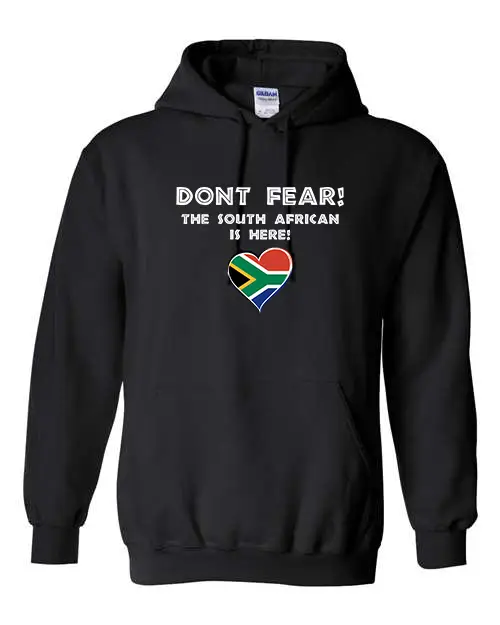 Black hoodie with “Don’t Fear! The South African is Here” text and a South African heart emblem.