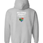 Back view of a light grey hoodie featuring “Biltong Addict” text, a South African flag heart, and “Proudly Powered by Dried Meat.”